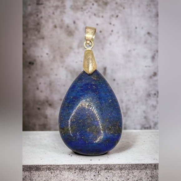Lapis lazuli gemstone teardrop pendant. Pendant measures 1 3/4” long x 3/4” wide - Picture 2 of 2